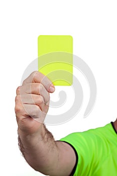 Referee with Yellow Card in Hand