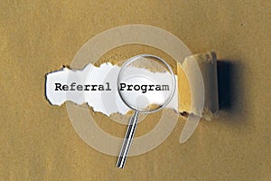 referral program on brown paper