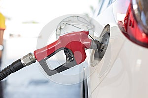 Refill and filling Oil Gas Fuel at station. Gas station refueling. To fill the machine with fuel. Car fill with gasoline at a gas