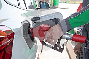 Refill fuel to a car at gas