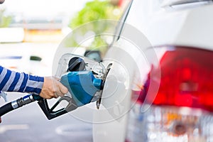 Refill fuel to a car at gas station