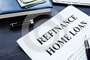 Refinance home loan form and money. photo