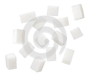Refined sugar cubes are flying on a white. Isolated