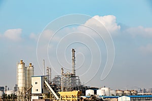 Refineries at the blue sky white cloud background