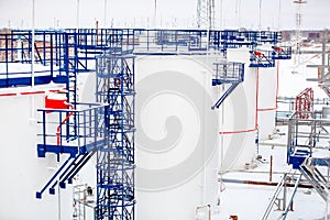 Refinery factory oil storage tanks close up