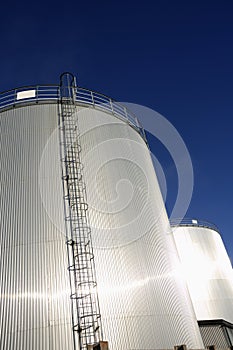 Refinery oil tanks in sunlight