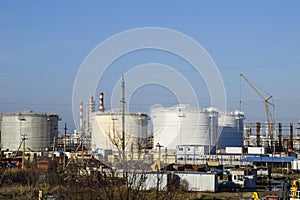 Refinery. Reservoirs for storage of refinery products. Rectification columns.