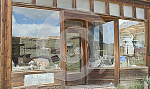 Reflected ghost town in storefront window