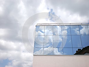 Reflected sky on building