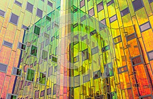 Reflecting facade of a modern office building in Deventer