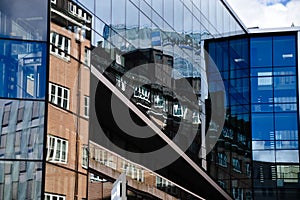 Reflecting modern building windows in urban architecture Oslo Norway