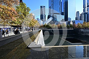 Reflecting pool and surrounding buildings at National September 11 Memorial.