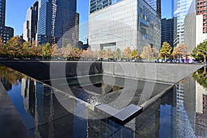 Reflecting pool and surrounding buildings at National September 11 Memorial