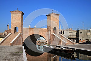 Reflecting Trepponti bridge in Comacchio, Italy