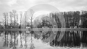 Reflection of a black and white landscape in the water