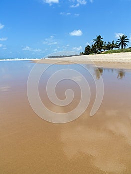 Reflection of blue sky in the sea calm water