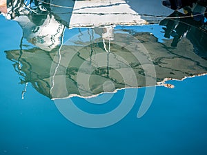 Reflection of a boat at jaffa port