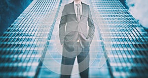 Reflection of a businessman in modern skyscraper. Business leader, career growth