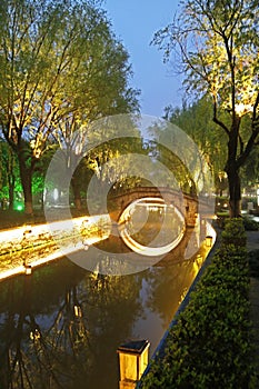 Reflection in a canal in the city of Shaoxing, Zhejiang, China