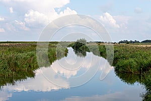 Reflection in a canal at Katinger Watt