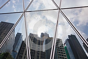 Reflection of city office building and sky background