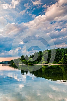 Reflection of clouds and trees in Lake Marburg, at Codorus State