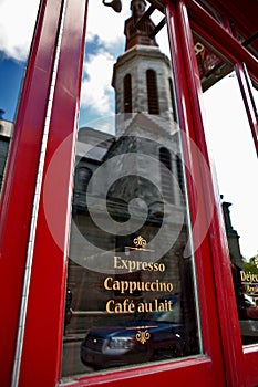 Reflection in a coffe shop window