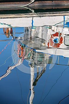 Reflection of a fishing boat