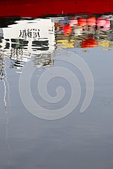 Reflection of Fishing Boat in Harbour