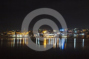 Reflection of the ghats in Pushkar in the lake