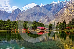 Reflection in the high altitude Kachora lake in the karakoram mountains near Skardu