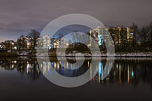 Reflection of high-rise residential buildings in the lake 1