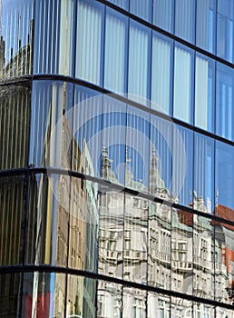 Reflection of the historic ancient palace on the stained glass w