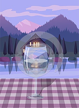 Reflection of a house and a lake in the glass