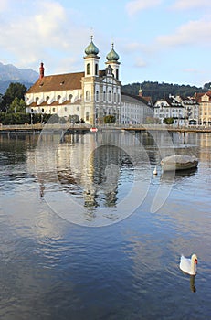 Reflection of Jesuitenkirche in the Reuss river, Luzern.