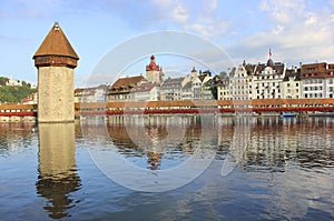 Reflection of Kappelbrucke and Wasserturmin the Reuss river. Luzern