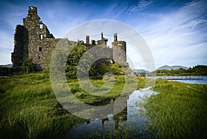 Reflection of Kilchurn Castle in Loch Awe, Highlands, Scotland, United Kingdom.