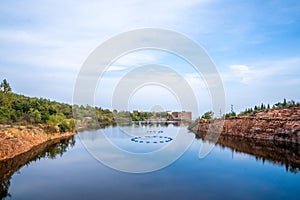 The reflection of the lake under the blue sky