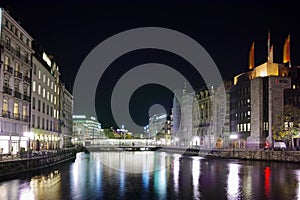 Reflection of lighs in RhÃÂ¾ne River, Geneva