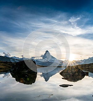 Reflection of matterhorn in mountain lake