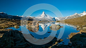 Reflection of matterhorn in mountain lake