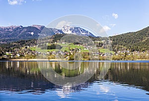 Reflection of mountain village in Hallstatter See, Austria, Euro photo