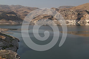 The reflection of the mountains in the Tigris River near the city of Hasankeyf, Turkey