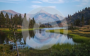 Reflection of Mt Dana on high alpine lake