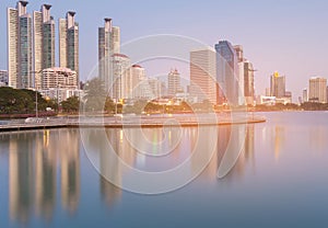 Reflection over office building in public park