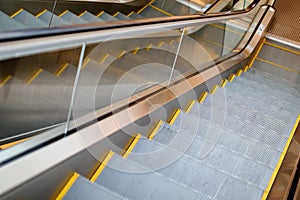 Reflection pattern of Electric Escalator in metro. moving up st