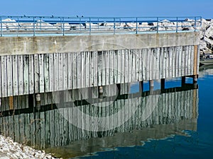 Reflection of Pier on Lake Michigan Harbor