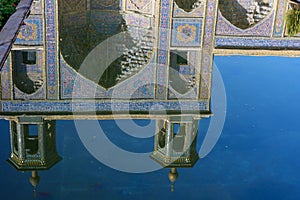 Reflection in pond of Nasir Ol-Molk mosque, also famous as Pink Mosque. Shiraz. Iran