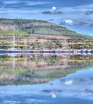 Reflection in Porto Conte harbor, Sardinia