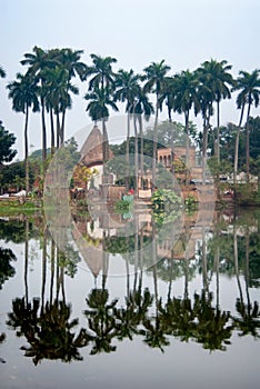 Reflection of Puthia Village the Temple Complex over the lake,Rajshahi district, Bangladesh. photo